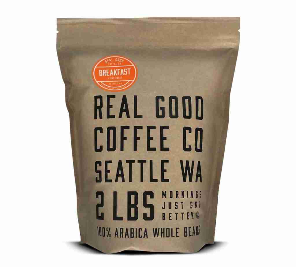 A new bag of 100% Arabica whole bean lightly roasted coffee by real good coffee co.