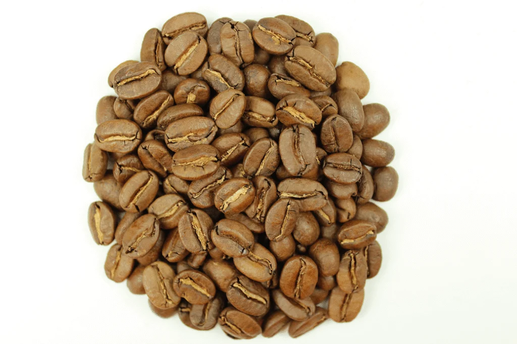 How to Roast Coffee Beans at Home 6 A pile of lightly roasted coffee beans.