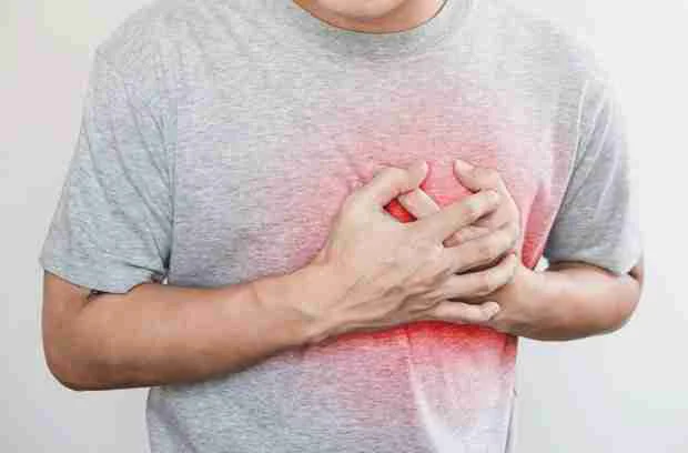What Is Bulletproof Coffee? Complete Health Guide 9 Man holding his chest