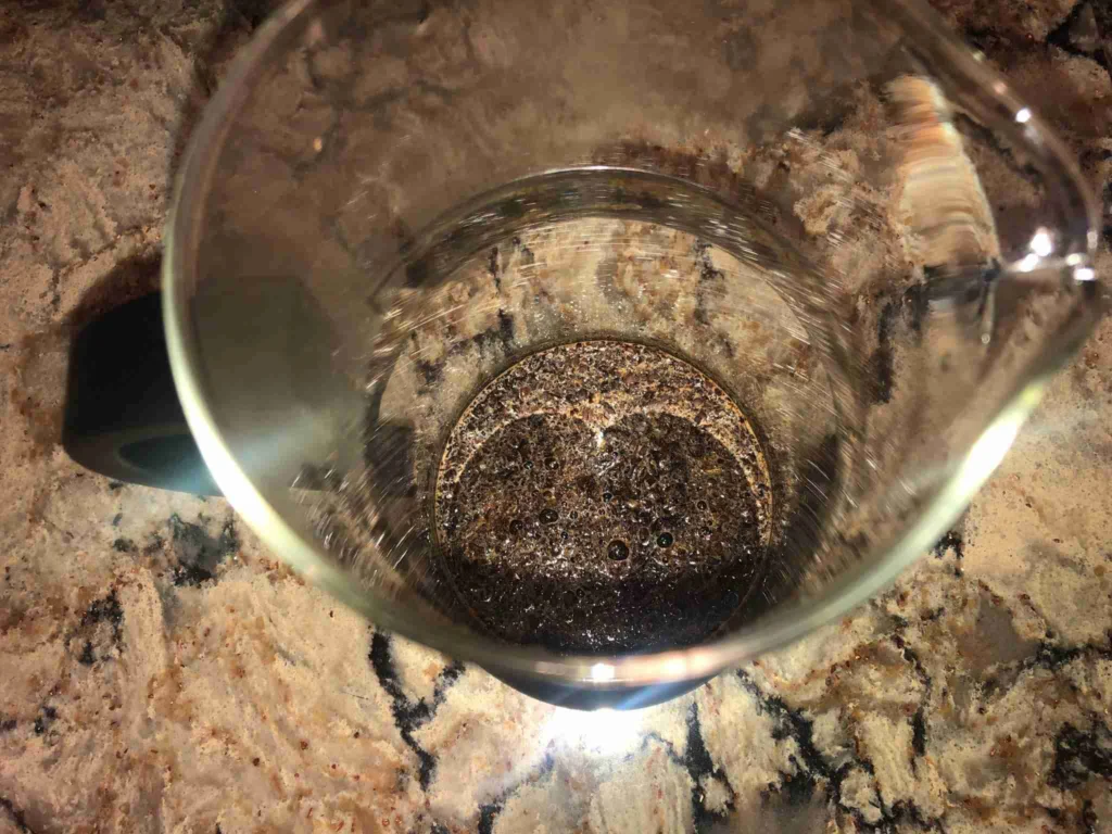 How to Make French Press Coffee 11 Blooming coffee grounds in a French press