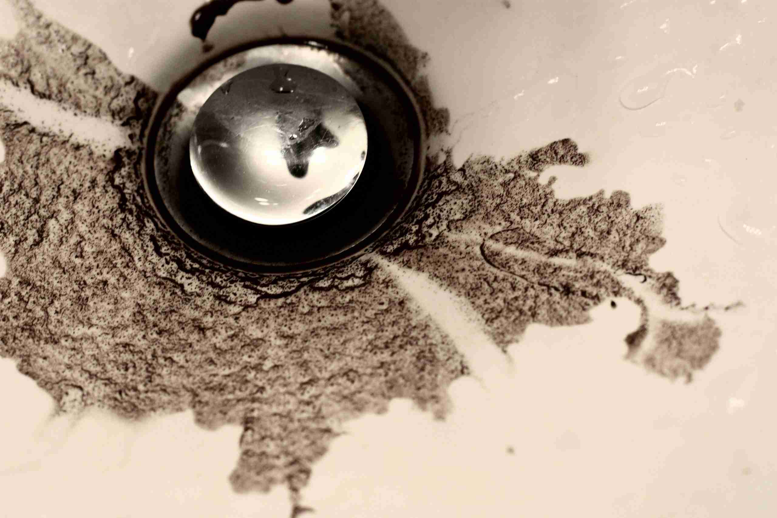 coffee grounds clogging kitchen sink